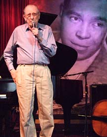 Joe Segal preaches from the stage [Photo by Tom Ineck]