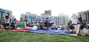 High-rise condos encircle Turner Park and help shield concert-goers from sun. [Photo by Jesse Starita]