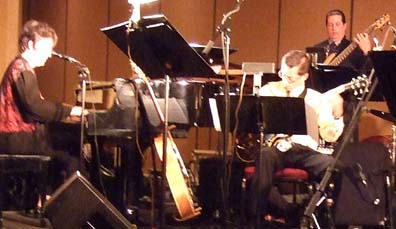 Hunt at the piano with bassist Andy Hall and guitarist Peter Bouffard [Photo by Tom Ineck]