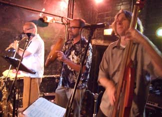 Ed Love, flute; Mike Brownson, trumpet and percussion; and Brian Morrow, bass [Photo by Tom Ineck]