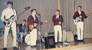 Butch (second from left with guitar) with The Impacts