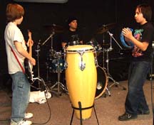 The Academy of Rock uses Berman bass guitar, conga and tambourine. [Photo by Tom Ineck]