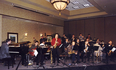 Greg Abate fronts the Nebraska Jazz Orchestra [Photo by Tom Ineck]