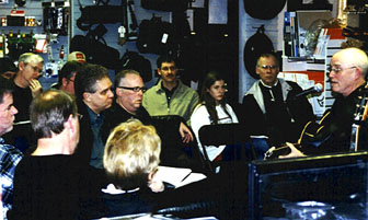 Jerry Hahn (right) conducts guitar clinic at Dietze Music House. [Photo by Rich Hoover]