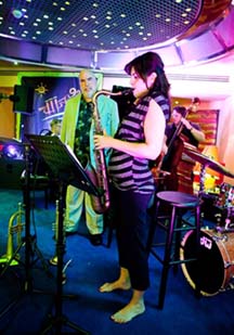 Randy Brecker, saxophonist Ada Rovatti and bassist Steve LaSpina on opening night in the Crow's Nest [Photo by Fran Kaufman]