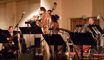 Robinson plays trumpet with NJO rhythm section. [Photo by Tom Ineck]