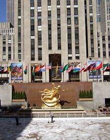 Workers remove ice at Rockefeller Plaza [Photo by Tom Ineck]