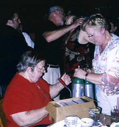 Russ Long signs autograph [Photo by Butch Berman]