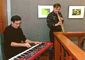 John Carlini and Bill Wimmer provide music for grand opening. [Photo by Richard S. Hay]