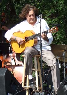 Toninho Horta on acoustic guitar [Photo by Tom Ineck]