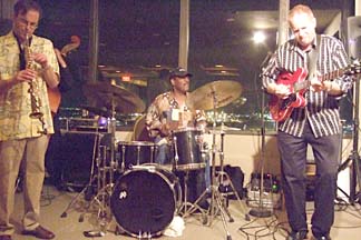 Dave Stryker bears down on guitar solo. [Photo by Tom Ineck]