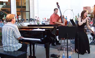 Kimbrough, Johnson and Shank working together [Photo by Tom Ineck]