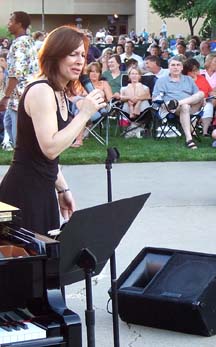 Kendra Shank improvises vocal [Photo by Tom Ineck]