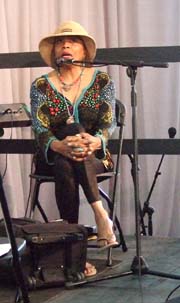 Singer Dee Dee Bridgewater is interviewed at Music Heritage Stage. [Photo by Tom Ineck]
