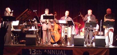 Ruth Naomi Floyd (left) sings with front-line horn accompaniment by Benny Maupin, Craig Handy, David Weiss and Bobby Watson. [Photo by Tom Ineck] 