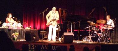 Saxophonist Charles Lloyd fronts Sangam, with tabla master Zakir Hussain and drummer Eric Harland. [Photo by Tom Ineck]