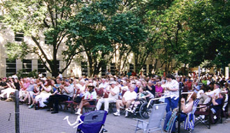 Crowd gathers for Topeka Yard Party May 28. [Photo by Tom Ineck]