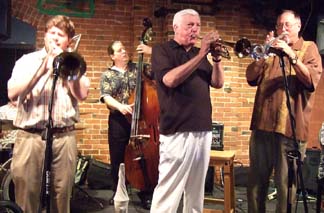 Trombonist Bryant Scott, bassist Andy Hall, trumpeters Mac McCune and John Mills [Photo by Tom Ineck]