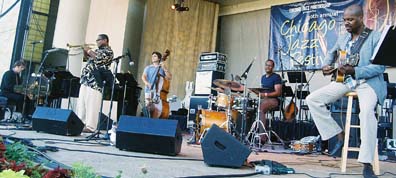 Trumpeter Pharez Whitted is  joined by pianist Ron Perrillo, bassist Dennis Carroll, drummer Kobie Watkins and guitarist Bobby Broom. [Photo by Tom Ineck]